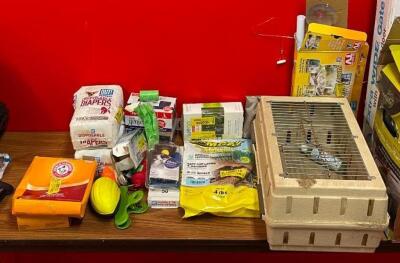 ASSORTED PET CARE ITEMS AS SHOWN (DIAPERS, WASTE BAGS, PEST REPELLENT, CARRYING KENNEL, BARK CONTROL, ETC.)