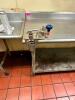 DESCRIPTION: 96" X 30" STAINLESS TABLE W/ 4" BACK SPLASH AND MOUNTED CAN OPENER. SIZE 96" X 30" LOCATION: KITCHEN QTY: 1 - 2