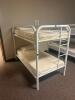 DESCRIPTION: TWIN OVER TWIN WHITE METAL FRAMED BUNK BED WITH MATTRESSES RETAIL PRICE: 233.8 ADDITIONAL INFORMATION: GREAT CONDITION WITH MINOR COSMETI