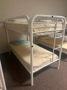 DESCRIPTION: TWIN OVER TWIN WHITE METAL FRAMED BUNK BED WITH MATTRESSES RETAIL PRICE: 233.8 ADDITIONAL INFORMATION: GREAT CONDITION WITH MINOR COSMETI