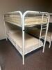 DESCRIPTION: TWIN OVER TWIN WHITE METAL FRAMED BUNK BED WITH MATTRESSES RETAIL PRICE: 233.8 ADDITIONAL INFORMATION: GREAT CONDITION WITH MINOR COSMETI