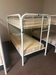 DESCRIPTION: TWIN OVER TWIN WHITE METAL FRAMED BUNK BED WITH MATTRESSES RETAIL PRICE: 233.8 ADDITIONAL INFORMATION: GREAT CONDITION WITH MINOR COSMETI