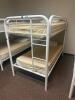 DESCRIPTION: TWIN OVER TWIN WHITE METAL FRAMED BUNK BED WITH MATTRESSES RETAIL PRICE: 233.8 ADDITIONAL INFORMATION: GREAT CONDITION WITH MINOR COSMETI