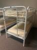 DESCRIPTION: TWIN OVER TWIN WHITE METAL FRAMED BUNK BED WITH MATTRESSES RETAIL PRICE: 233.8 ADDITIONAL INFORMATION: GREAT CONDITION WITH MINOR COSMETI