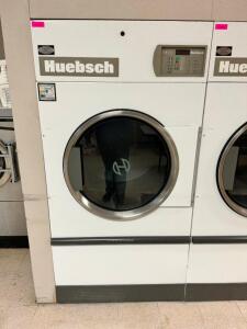 DESCRIPTION: HUEBSCH COMMERCIAL DRYER BRAND / MODEL: HUEBSCH HT075NOMB1G1W03 ADDITIONAL INFORMATION 120 VOLT, 1 PHASE, NATURAL GAS LOCATION: LAUNDRY Q