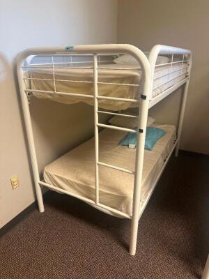 DESCRIPTION: TWIN OVER TWIN WHITE METAL FRAMED BUNK BED WITH MATTRESSES RETAIL PRICE: 233.8 ADDITIONAL INFORMATION: GREAT CONDITION WITH MINOR COSMETI