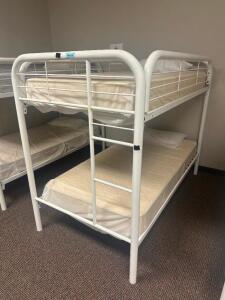 DESCRIPTION: TWIN OVER TWIN WHITE METAL FRAMED BUNK BED WITH MATTRESSES RETAIL PRICE: 233.8 ADDITIONAL INFORMATION: GREAT CONDITION WITH MINOR COSMETI