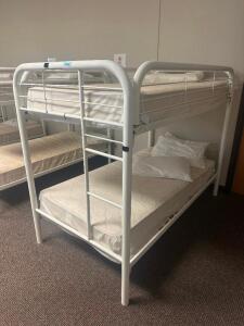 DESCRIPTION: TWIN OVER TWIN WHITE METAL FRAMED BUNK BED WITH MATTRESSES RETAIL PRICE: 233.8 ADDITIONAL INFORMATION: GREAT CONDITION WITH MINOR COSMETI