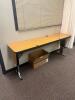 DESCRIPTION: 72" ADJUSTABLE HEIGHT LAMINATE TOP SEMINAR TABLE WITH FOLDING PANEL LEGS RETAIL PRICE: $200 ADDITIONAL INFORMATION: TABLE ONLY. EXCELLENT - 2