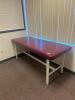 DESCRIPTION: 72" METAL FRAME VINYL FLAT TOP STRAIGHT LINE TREATMENT TABLE RETAIL PRICE: $500.00 ADDITIONAL INFORMATION: EXCELLENT CONDITION. STOCK PHO - 2