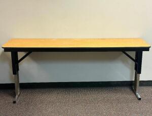 DESCRIPTION: 72" ADJUSTABLE HEIGHT LAMINATE TOP SEMINAR TABLE WITH FOLDING PANEL LEGS RETAIL PRICE: $200 ADDITIONAL INFORMATION: TABLE ONLY. EXCELLENT
