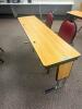 DESCRIPTION: 72" ADJUSTABLE HEIGHT LAMINATE TOP SEMINAR TABLE WITH FOLDING PANEL LEGS RETAIL PRICE: $200 ADDITIONAL INFORMATION: TABLE ONLY. EXCELLENT - 2