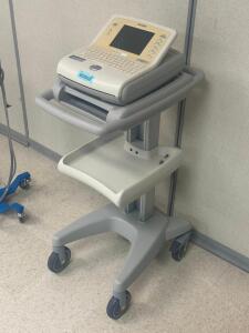 DESCRIPTION: PAGEWRITER TRIM III ECG / EKG MACHINE WITH ROLLING STAND BRAND / MODEL: PHILIPS RETAIL PRICE: $4,900.00 LOCATION: CLINIC 5 THIS LOT IS: O