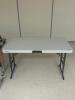 DESCRIPTION: 4 FT. FOLDING TABLE BRAND / MODEL: LIFETIME LOCATION: CLINIC 6 THIS LOT IS: ONE MONEY QTY: 1 - 2