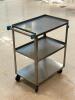 DESCRIPTION: (2) - THREE TIER STAINLESS STEEL UTILITY CARTS BRAND / MODEL: LAKESIDE RETAIL PRICE: $246.00 EACH ADDITIONAL INFORMATION: GREAT CONDITION - 2