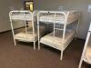 DESCRIPTION: (2) - TWIN OVER TWIN WHITE METAL FRAMED BUNK BEDS WITH MATTRESSES RETAIL PRICE: $233.80 EACH ADDITIONAL INFORMATION: (2) - BUNK BEDS TOTA - 2