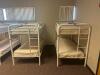 DESCRIPTION: (2) - TWIN OVER TWIN WHITE METAL FRAMED BUNK BEDS WITH MATTRESSES RETAIL PRICE: $233.80 EACH ADDITIONAL INFORMATION: (2) - BUNK BEDS TOTA - 2