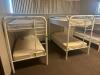 DESCRIPTION: (2) - TWIN OVER TWIN WHITE METAL FRAMED BUNK BEDS WITH MATTRESSES RETAIL PRICE: $233.80 EACH ADDITIONAL INFORMATION: (2) - BUNK BEDS TOTA - 2