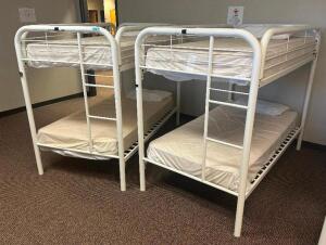 DESCRIPTION: (2) - TWIN OVER TWIN WHITE METAL FRAMED BUNK BEDS WITH MATTRESSES RETAIL PRICE: $233.80 EACH ADDITIONAL INFORMATION: (2) - BUNK BEDS TOTA