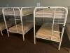 DESCRIPTION: (2) - TWIN OVER TWIN WHITE METAL FRAMED BUNK BEDS WITH MATTRESSES RETAIL PRICE: $233.80 EACH ADDITIONAL INFORMATION: (2) - BUNK BEDS TOTA - 2