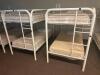 DESCRIPTION: (2) - TWIN OVER TWIN WHITE METAL FRAMED BUNK BEDS WITH MATTRESSES RETAIL PRICE: $233.80 EACH ADDITIONAL INFORMATION: (2) - BUNK BEDS TOTA - 2