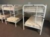 DESCRIPTION: (2) - TWIN OVER TWIN WHITE METAL FRAMED BUNK BEDS WITH MATTRESSES RETAIL PRICE: $233.80 EACH ADDITIONAL INFORMATION: (2) - BUNK BEDS TOTA - 2