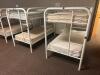 DESCRIPTION: (2) - TWIN OVER TWIN WHITE METAL FRAMED BUNK BEDS WITH MATTRESSES RETAIL PRICE: $233.80 EACH ADDITIONAL INFORMATION: (2) - BUNK BEDS TOTA - 2