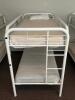 DESCRIPTION: (4) - TWIN OVER TWIN WHITE METAL FRAMED BUNK BEDS WITH MATTRESSES RETAIL PRICE: $233.80 EACH ADDITIONAL INFORMATION: (4) - BUNK BEDS TOTA - 8