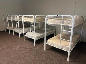 DESCRIPTION: (4) - TWIN OVER TWIN WHITE METAL FRAMED BUNK BEDS WITH MATTRESSES RETAIL PRICE: $233.80 EACH ADDITIONAL INFORMATION: (4) - BUNK BEDS TOTA