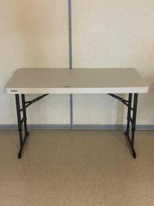 DESCRIPTION: (2) - 4 FT. FOLDING TABLE BRAND / MODEL: LIFETIME LOCATION: CLINIC 8 THIS LOT IS: SOLD BY THE PIECE QTY: 2