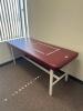 DESCRIPTION: 72" METAL FRAME VINYL FLAT TOP STRAIGHT LINE TREATMENT TABLE RETAIL PRICE: $500.00 ADDITIONAL INFORMATION: EXCELLENT CONDITION. STOCK PHO - 2