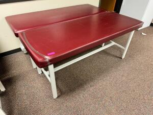 DESCRIPTION: (2) 70" X 30" THERAPY BEDS ADDITIONAL INFORMATION MAROON CUSHION TOP LOCATION: CART ROOM THIS LOT IS: SOLD BY THE PIECE QTY: 2