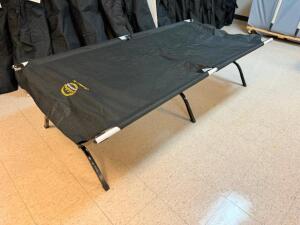 DESCRIPTION: CABELA'S OUTFITTER XL 600 LB. CAPACITY COT ADDITIONAL INFORMATION W/ CANVAS CARRY BAG. LOCATION: COT ROOM QTY: 1