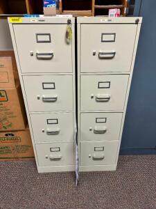 (2) FOUR DRAWER METAL FILE CABINETS.