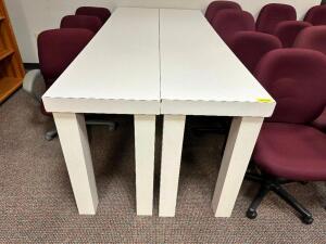 (4) 8' X 20" WHITE COMPOSITE TABLES.