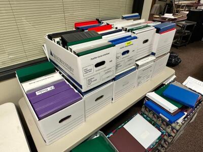 LOT OF ASSORTED OFFICE BINDERS.