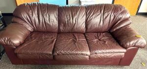 THREE CUSHION MAROON PLEATHER SOFA