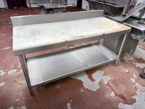 DESCRIPTION: 72" X 30" MEAT ROOM TABLE W/ CUTTING BOARD TOP. SIZE 72" X 30" LOCATION: MEAT ROOM QTY: 1