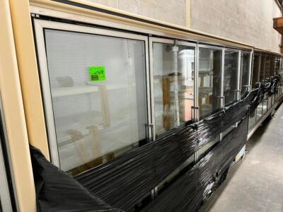 DESCRIPTION: (18) DOOR ZERO ZONE GLASS FREEZER CASE. BRAND / MODEL: ZERO ZONE Z-RMZC-30 ADDITIONAL INFORMATION (2) 5 DOOR SECTIONS AND (2) 4 DOOR SECT