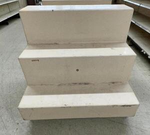 DESCRIPTION: 38" X 47" THREE TIER FIBERGLASS DISPLAY UNIT SIZE 38" X 47" LOCATION: FLOOR QTY: 1