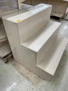 DESCRIPTION: 38" X 47" THREE TIER FIBERGLASS DISPLAY UNIT SIZE 38" X 47" LOCATION: FLOOR QTY: 1