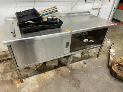 DESCRIPTION: 72" X 30" AL STAINLESS TABLE W/ LOWER STORAGE CABINET. SIZE 72" X 30" LOCATION: BACK WAREHOUSE QTY: 1