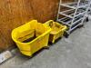 DESCRIPTION: (4) YELLOW PLASTIC MOP BUCKETS. ADDITIONAL INFORMATION NO WRINGERS LOCATION: BACK WAREHOUSE THIS LOT IS: ONE MONEY QTY: 1 - 2