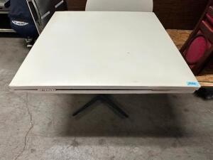 42" X 42" DROP LEAF TABLE W/ BASE. WILL FORM A 60" ROUND TOP