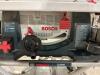 DESCRIPTION: 10" WORKSITE TABLE SAW WITH GRAVITY-RISE STAND BRAND/MODEL: BOSCH 4100 LOCATION: WAREHOUSE QTY: 1 - 3