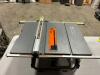 DESCRIPTION: 10" TABLE SAW BRAND/MODEL: RIDGID R4514T LOCATION: WAREHOUSE QTY: 1 - 5