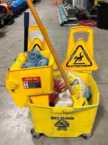 DESCRIPTION: MOP BUCKET WITH WRINGER, MOP AND WET FLOOR SIGNS LOCATION: WAREHOUSE QTY: 1