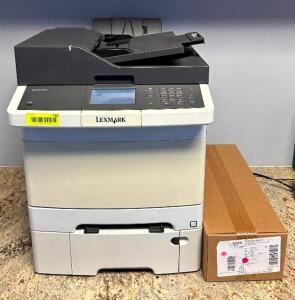 DESCRIPTION: COLOR LASER MULTI-FUNCTION PRINTER WITH ADDITIONAL INK CARTRIDGE BRAND/MODEL: LEXMARK CX410DE LOCATION: OFFICE HALLWAY QTY: 1