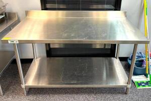 DESCRIPTION: 5' STAINLESS STEEL TABLE WITH UNDERSHELF SIZE: 60"X30"X34.5" LOCATION: MAIN OFFICE QTY: 1
