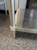 DESCRIPTION: 5' STAINLESS STEEL TABLE WITH UNDERSHELF SIZE: 60"X30"X34.5" LOCATION: MAIN OFFICE QTY: 1 - 5